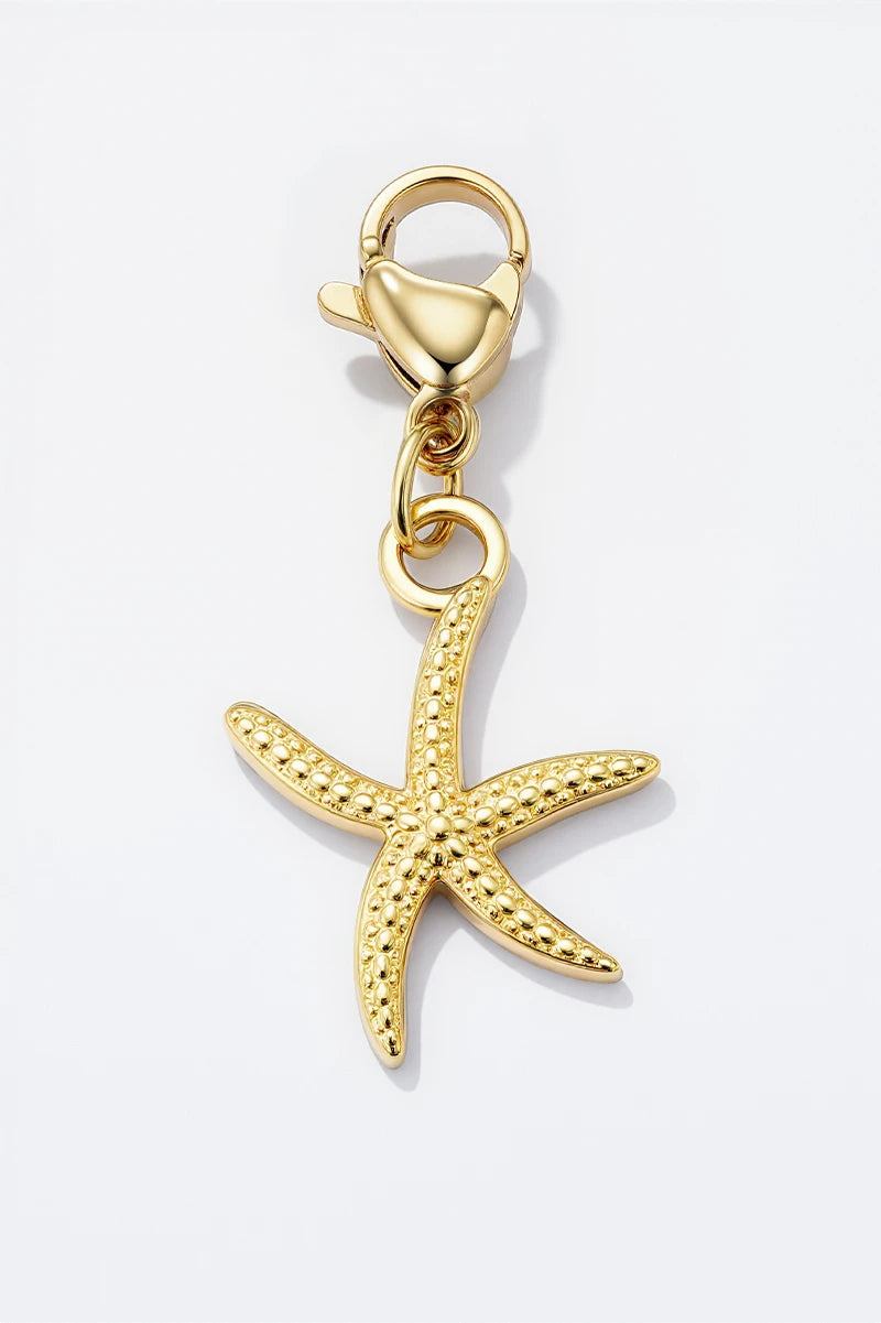 Colgante charm estrella dorado