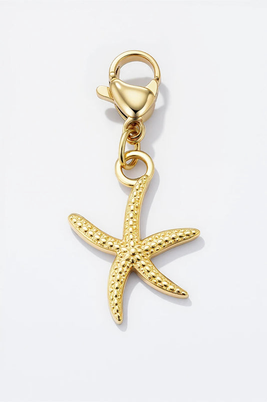 Colgante charm estrella dorado